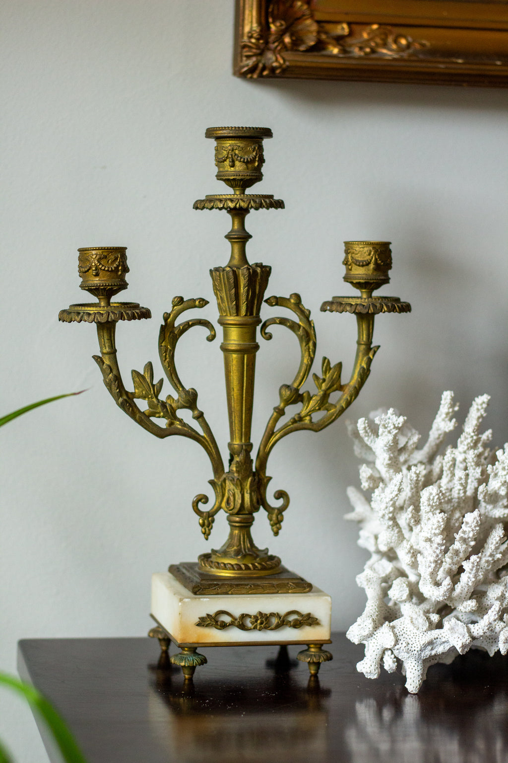 antique three-arm candelabras