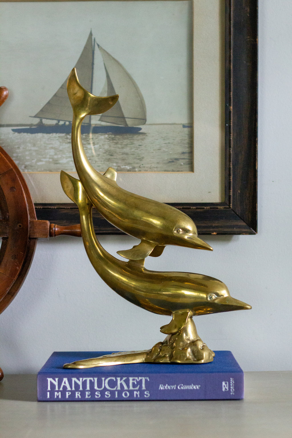 Vintage brass dolphins