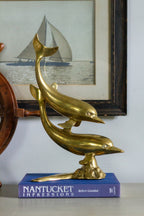 Vintage brass dolphins