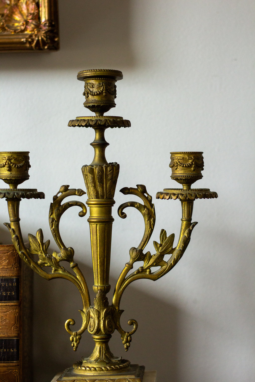 antique three-arm candelabras
