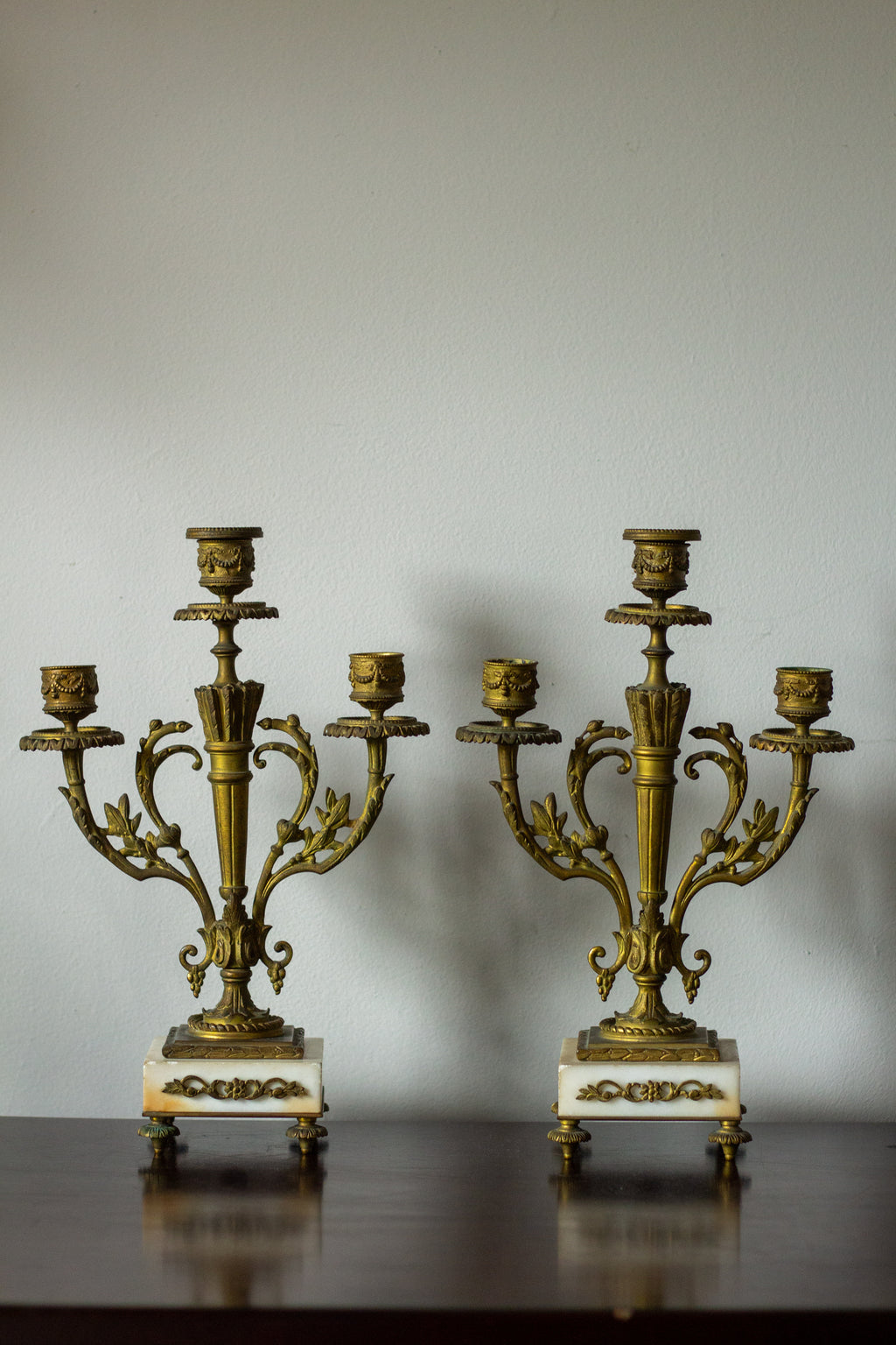 antique three-arm candelabras