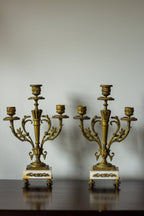 antique three-arm candelabras